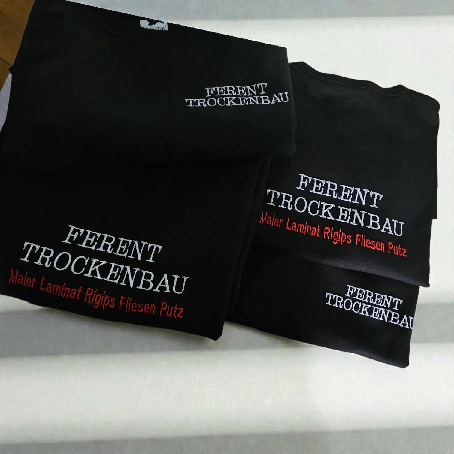 Bestickte schwarze Firmen-T-Shirts für Ferent Trockenbau